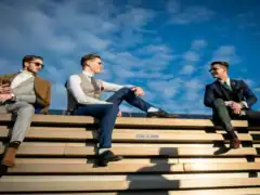 Elegant men's fashion with suits and accessories, trendy style for modern professionals.